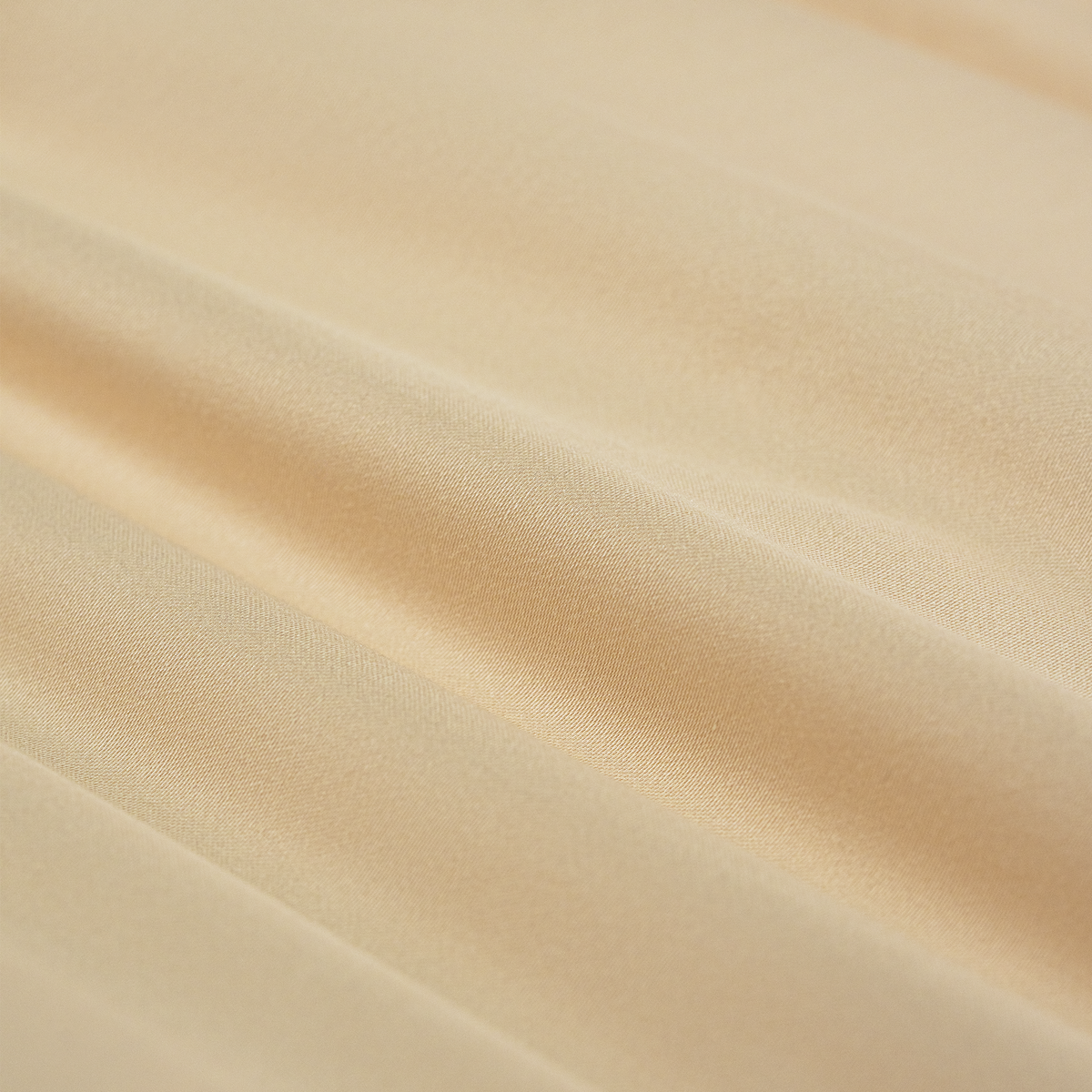 Close-up of the Dune Sand duvet cover fabric
